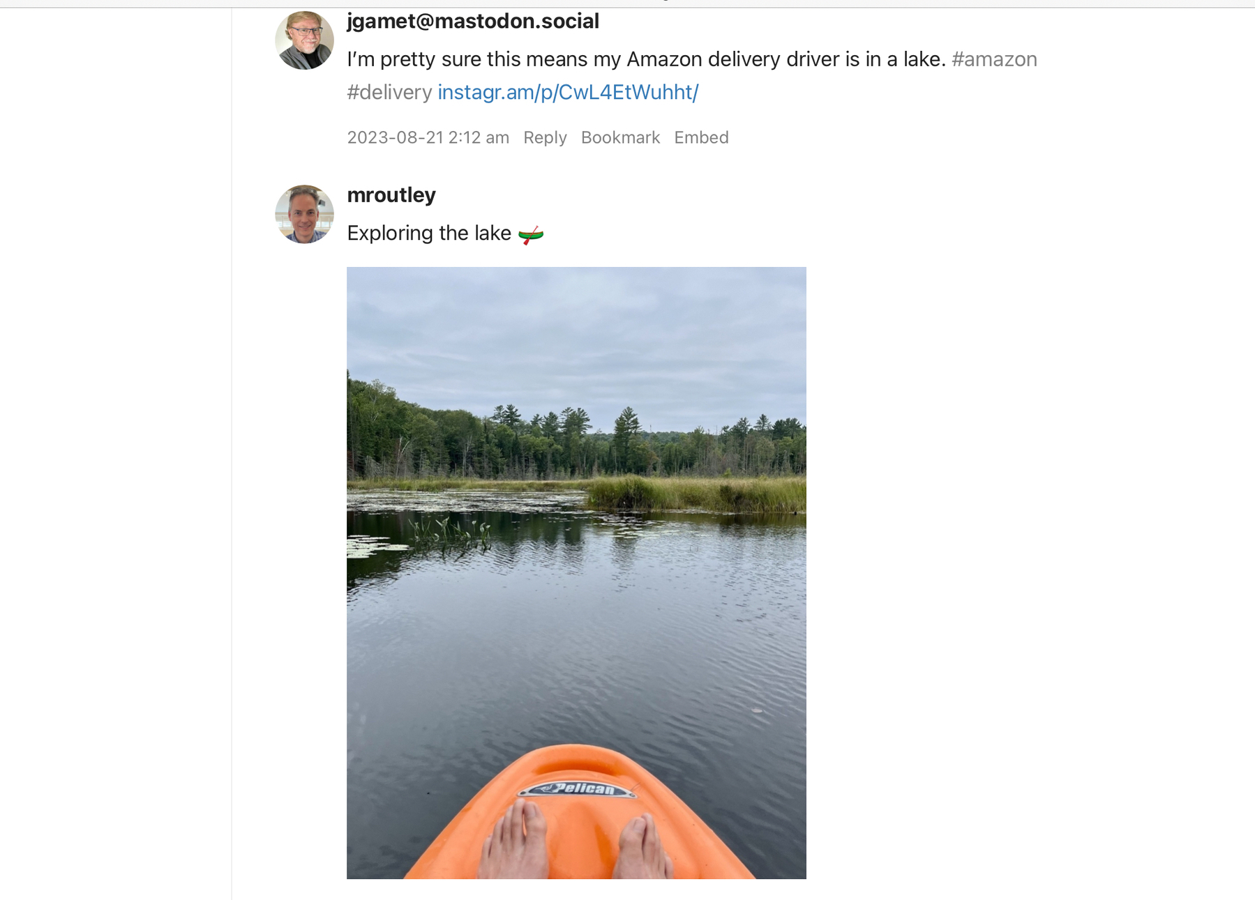 photo of lake with someone barefeet in a boat